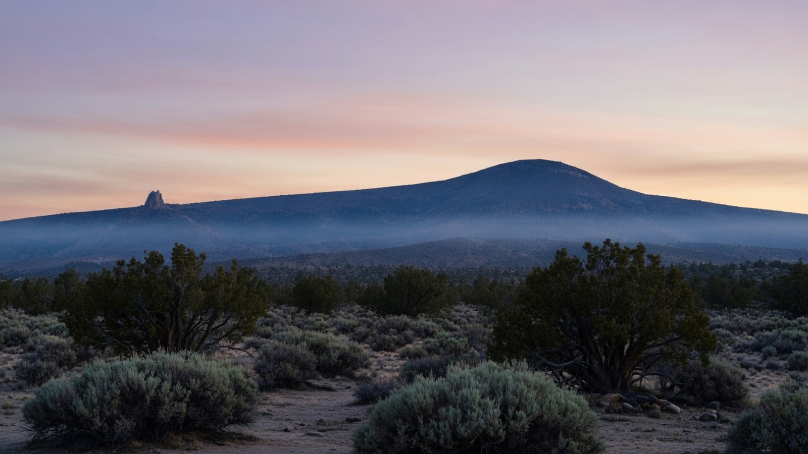 Sleeping Ute Mountain rising over high-desert sagebrush and juniper near Cortez, Colorado